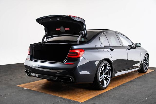 BMW 7-SERIE 750i xDrive High Executive M Sport - schuif/kanteldak - Head up - stoelverwarming/massage/ventilatie voor en achter - Harman kardon - Surround View - BMW Laserlight - Comfort Access - Soft close -