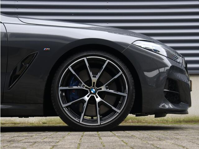 BMW 8-SERIE Coupé M850i xDrive | High Executive | M Sport | Driving Assistant Prof. | Carbon Exterieur Pack | Bowers & Wilkins | Adaptief M Onderstel | Laserlight | Active Steering | Parking Assistant Plus | 20'' LMV