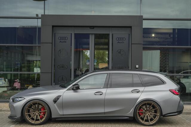 BMW M3 Touring Competition 510pk xDrive Widescreen Frozen grey *BTW* Head-up Adaptive cruise CSL grille 21" LMV