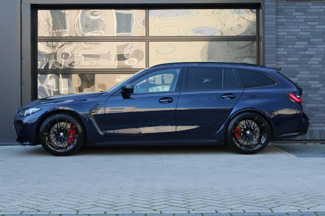 BMW M3 3-serie Touring xDrive Competition | NIEUWSTAAT! | HUD | H&K | MEMORY | CARBON | KEYLESS |