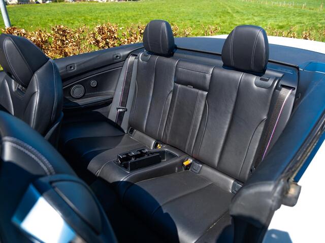 BMW M4 4-serie Cabrio | M-Performance uitlaat | H&K Surround | Adap M- onderstel | Hud Display | Nav Proff | 360 Cam | Lane Assist | Nekverwarming | Stuur- Stoelverw | BMW Onderhouden | 2 eig