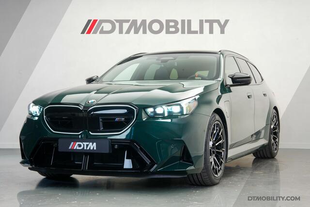 BMW M5 5-serie Touring | M-Drivers Pack | Keramisch | Akrapovic | Goodwood Grün Sonderlackierung