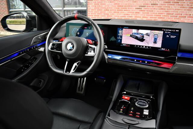 BMW M5 Touring Kreidegrau Ind. | Ultimate Pack | Keramisch | Pano | Trekh | B&W | DA+