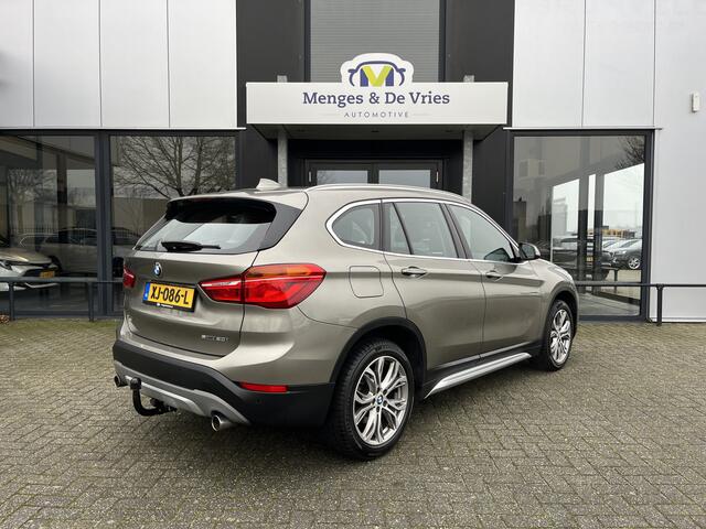 BMW X1 sDrive20i Orange Edition II Trekhaak | Stoelverwarming | LED | NAP | Head-Up display | Leder | Isofix