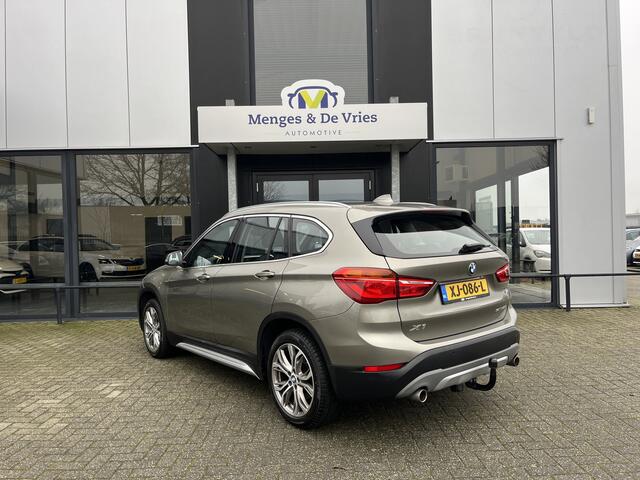 BMW X1 sDrive20i Orange Edition II Trekhaak | Stoelverwarming | LED | NAP | Head-Up display | Leder | Isofix