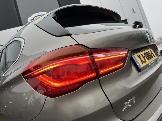 BMW X1 sDrive20i Orange Edition II Trekhaak | Stoelverwarming | LED | NAP | Head-Up display | Leder | Isofix