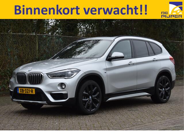 BMW X1 sDrive20i Orange Edition II Open dak | Cruise control | Navi | Trekhaak |