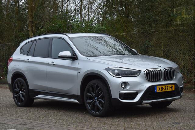 BMW X1 sDrive20i Orange Edition II Open dak | Cruise control | Navi | Trekhaak |
