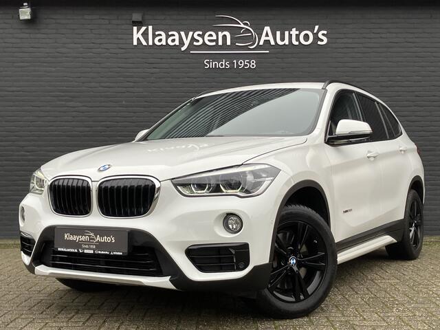 BMW X1 xDrive20i High Executive 192 pk AUT. | dealer onderhouden | navigatie | leder interieur | parkeersensoren | sportstoelen
