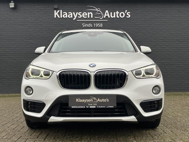 BMW X1 xDrive20i High Executive 192 pk AUT. | dealer onderhouden | navigatie | leder interieur | parkeersensoren | sportstoelen