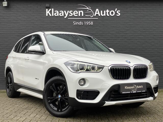BMW X1 xDrive20i High Executive 192 pk AUT. | dealer onderhouden | navigatie | leder interieur | parkeersensoren | sportstoelen