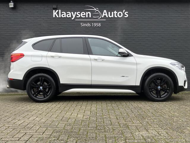 BMW X1 xDrive20i High Executive 192 pk AUT. | dealer onderhouden | navigatie | leder interieur | parkeersensoren | sportstoelen