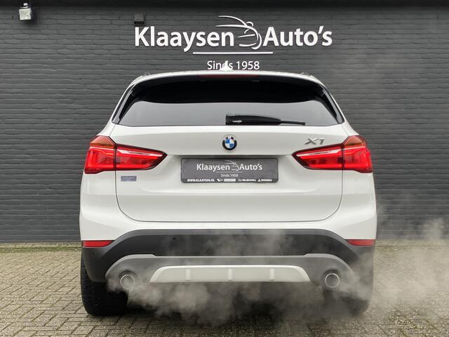 BMW X1 xDrive20i High Executive 192 pk AUT. | dealer onderhouden | navigatie | leder interieur | parkeersensoren | sportstoelen