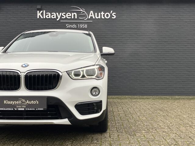 BMW X1 xDrive20i High Executive 192 pk AUT. | dealer onderhouden | navigatie | leder interieur | parkeersensoren | sportstoelen