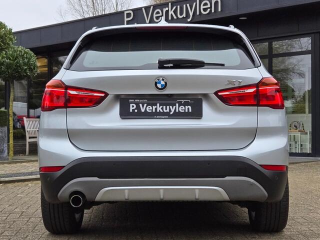 BMW X1 SDRIVE18I SPORTLINE I SPORTSTOELEN I CAMERA I 18 INCH I
