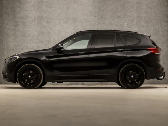 BMW X1 xDrive25e Sportline 221Pk Automaat (GROOT NAVI, DEALER ONDERHOUDEN, CLIMATE, STOELVERWARMING, CAMERA, SPORTSTOELEN, TREKHAAK, GETINT GLAS, CRUISE, NIEUWSTAAT)