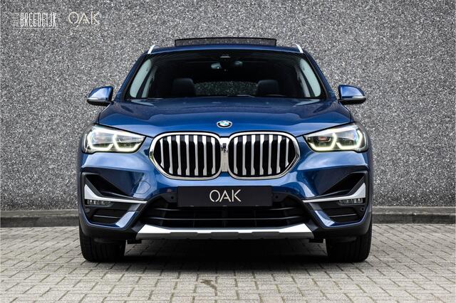 BMW X1 xDrive25e Aut. | X-Line | Navigatie | Panorama | Half Leder | Memory | Head-Up | Camera | 18"LM | Phytonic Blauw