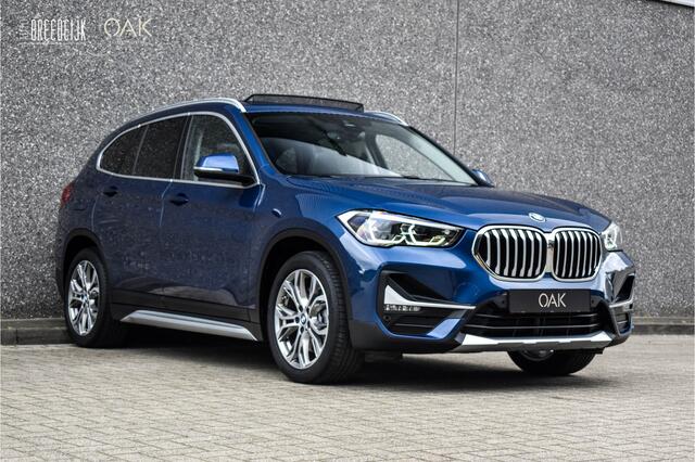 BMW X1 xDrive25e Aut. | X-Line | Navigatie | Panorama | Half Leder | Memory | Head-Up | Camera | 18"LM | Phytonic Blauw