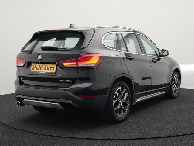BMW X1 xDrive25e X Line Plug In Hybrid 221pk Dealer O.H. PHEV | Sportstoelen Verwarmd | Adaptive Cruise | Navigatie | Sfeerverlichting | Climate Control | DAB | LED Koplampen | L.M. 18" |