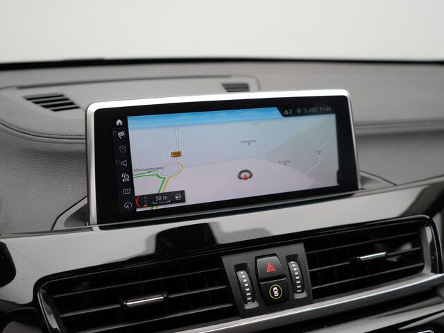 BMW X1 xDrive25e X Line Plug In Hybrid 221pk Dealer O.H. PHEV | Sportstoelen Verwarmd | Adaptive Cruise | Navigatie | Sfeerverlichting | Climate Control | DAB | LED Koplampen | L.M. 18" |