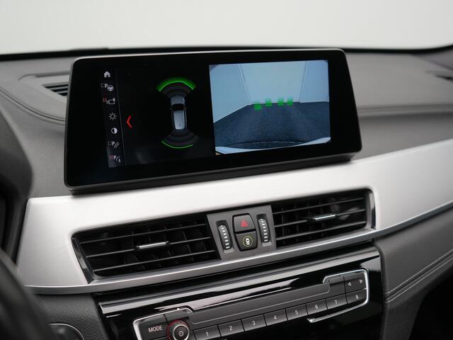 BMW X1 xDrive25e High Executive Plug In Hybrid 220pk Dealer O.H PHEV | Panodak | Adaptive Cruise | Lederen Sportstoelen Memory | Apple Carplay | Camera | 19"L.M | Head Up | Harman Kardon |