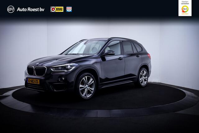 BMW X1 18iA High Executive PANO | HARMAN KARDON | ACC | MEMORY | CAMERA | HEAD UP | LEDER | STOELVERW | AFN TREKHAAK | KEYLESS | PDC V+A | LMV