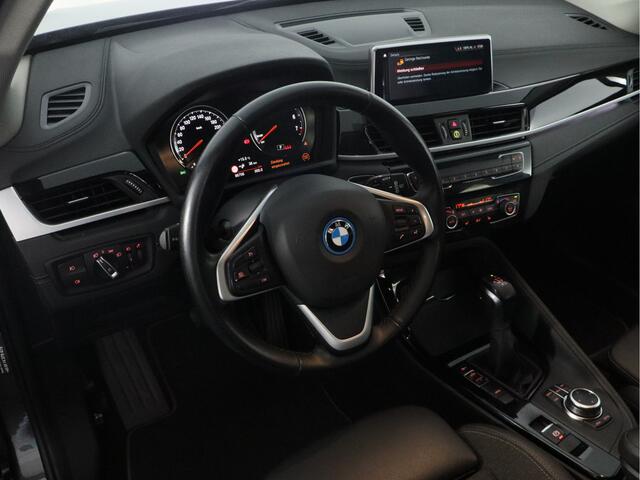 BMW X1 xDrive25e Business | Plug-in Hybrid | 1/2 leer | 18" velgen | Trekhaak | 4WD