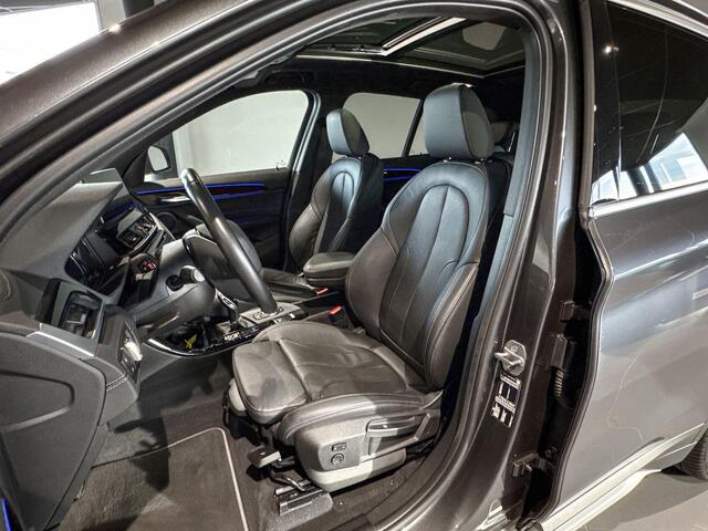 BMW X1 sDrive20i High Executive | Glazen Panoramadak | Stoelverwarming | Achteruitrijcamera | Trekhaak |