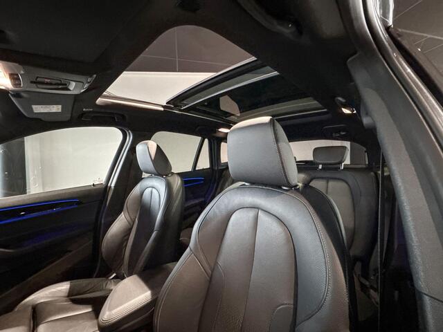 BMW X1 sDrive20i High Executive | Glazen Panoramadak | Stoelverwarming | Achteruitrijcamera | Trekhaak |