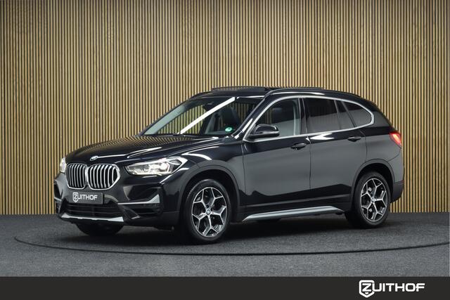 BMW X1 sDrive20i High Executive Edition | Elek. Glazen Panoramadak | Cruise-control | Afneembare Trekhaak | Elek. Achterklep | Clima | Navigatie | Parkeerhulp | Leder | Stoelverwarming