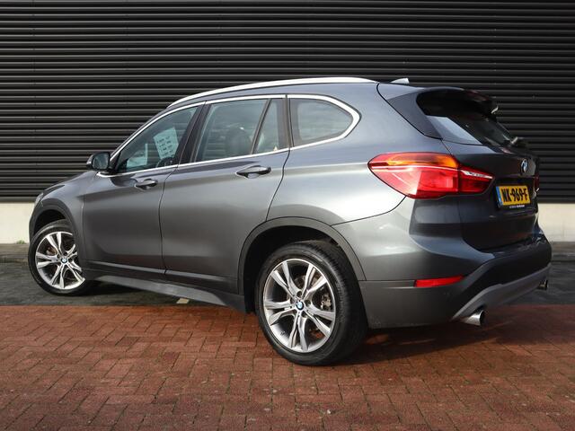 BMW X1 sDrive20i Centennial High Executive | Clima | Cruise | Navi | Leder | Stoelverwarming | Pano | Parkeer-assistent |
