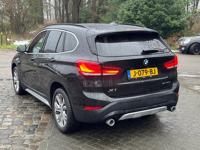BMW X1 sDrive 2.0i 192pk autom ecc,beigeleer,lmv,navi,led,chroom,dglas,camera