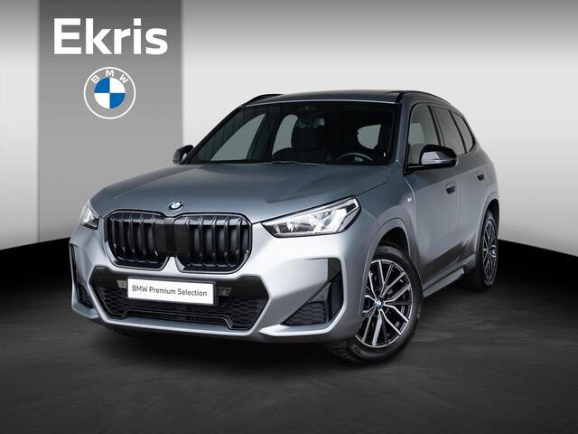 BMW X1 xDrive23i | M Sportpakket | Travel Pack | Achteruitrijcamera | Panoramadak | Stoelverwarming | 18''