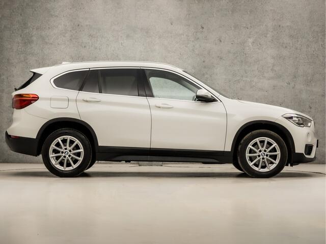 BMW X1 sDrive18i Sport 141Pk Automaat (NAVIGATIE, CLIMATE, PARKEERSENSOREN, SPORTSTOELEN, GETINT GLAS, CRUISE, XENON, NIEUWSTAAT)