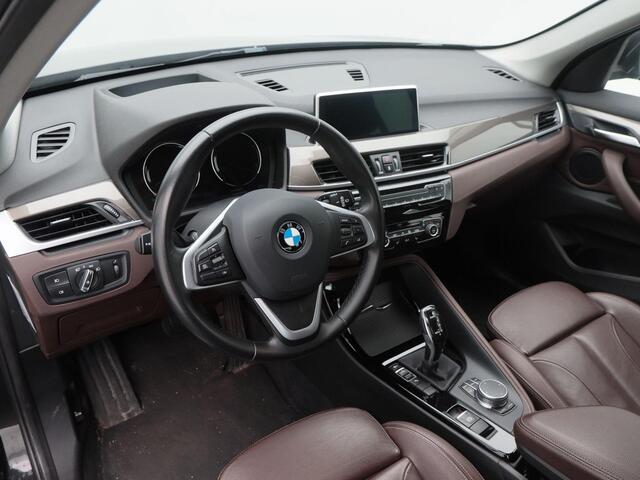 BMW X1 sDrive20i 192 Pk High Executive | Trekhaak | Leder | Cruise Control | Full LED | Stoelverwarming | Navigatie | 18 inch