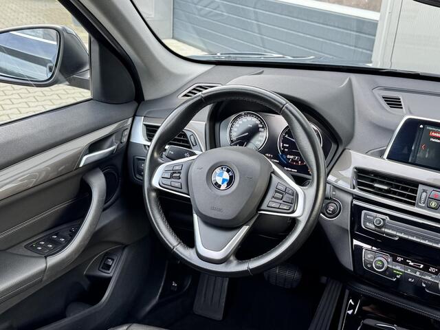 BMW X1 sDrive18i High Executive 140 pk | Trekhaak | 18 inch | X line | Led