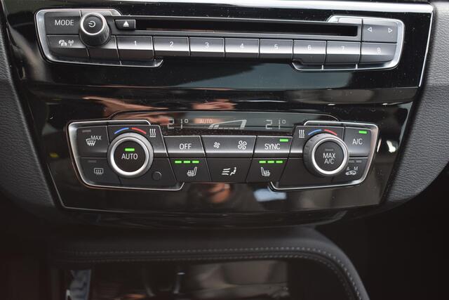 BMW X1 sDrive18i High Executive | Trekhaak | Pano | Leer | Stoelverwarming