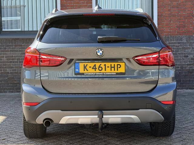 BMW X1 sDrive18i High Executive | AUTOMAAT | TREKHAAK | NAVI | ELEKTR KOFFERKLEP |