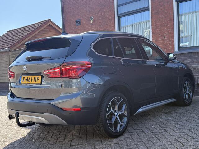 BMW X1 sDrive18i High Executive | AUTOMAAT | TREKHAAK | NAVI | ELEKTR KOFFERKLEP |