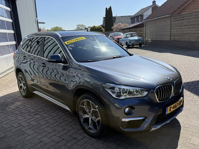 BMW X1 sDrive18i High Executive | AUTOMAAT | TREKHAAK | NAVI | ELEKTR KOFFERKLEP |