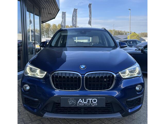 BMW X1 sDrive18i High Executive | NL AUTO | Automaat | Achteruitrijcamera | Navigatie | Parkeersensoren Voor en Achter | Lederen Bekleding | Stoelverwarming | Elektrische Achterklep | 2 Sleutels |