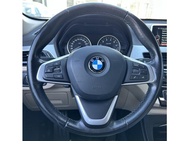 BMW X1 sDrive18i High Executive | NL AUTO | Automaat | Achteruitrijcamera | Navigatie | Parkeersensoren Voor en Achter | Lederen Bekleding | Stoelverwarming | Elektrische Achterklep | 2 Sleutels |