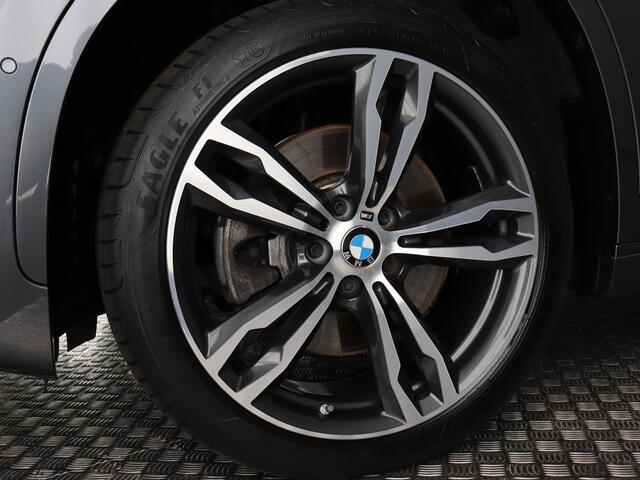BMW X1 xDrive25i High Executive (Afn. Trekhaak / Pano / H&K / Camera / ACC / Navi)