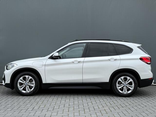BMW X1 BWJ 2021 xDrive25e 221 PK Business Edition Plus AUTOMAAT | TREKHAAK | PANO | STOELVERW. | LEDER | NAVI | CLIMA | CRUISE | CAMERA