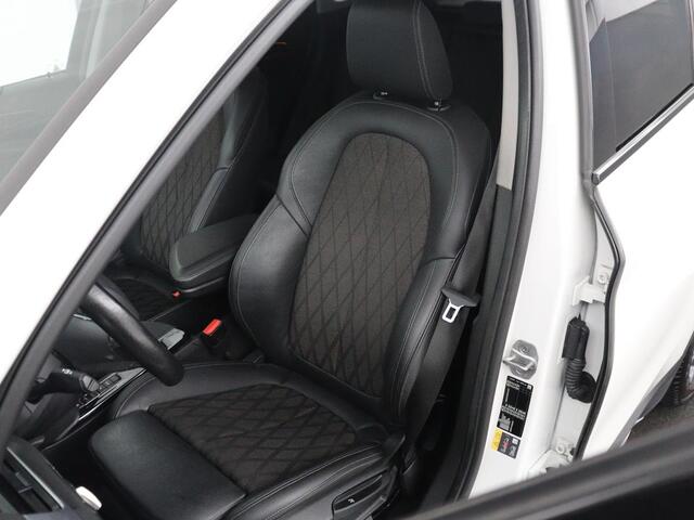 BMW X1 xDrive25e High Executive | SOH 85,2% | Half leder | Adaptive cruise | Stoelverwarming | Climate control | Navigatie | Camera | Park assist | Elektrische achterklep