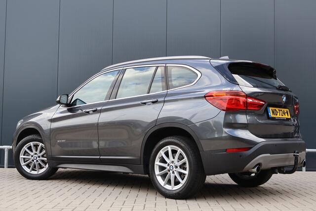 BMW X1 sDrive20i Centennial Executive 192pk Automaat | NL auto! | Trekhaak | Camera | Sportstoelen | Elektr. Achterklep