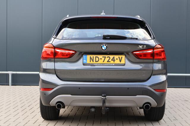 BMW X1 sDrive20i Centennial Executive 192pk Automaat | NL auto! | Trekhaak | Camera | Sportstoelen | Elektr. Achterklep
