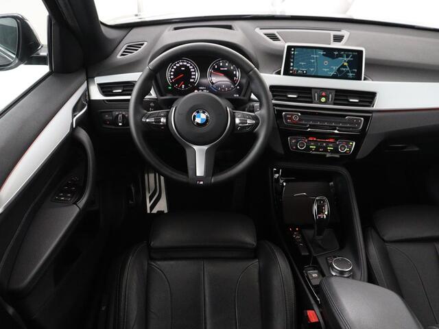 BMW X1 sDrive18i High Executive | Panoramadak | Leder | Stoelverwarming | Cruise control | Head-up | Navigatie | Bluetooth | Interieurverlichting | Elektrische achterklep | Trekhaak