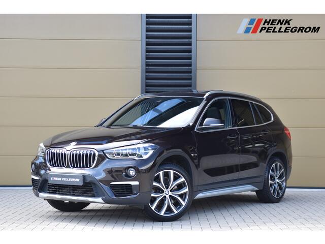 BMW X1 sDrive20i High Executive * Sportstoelen * Panoramadak * Achteruitrijcamera * Trekhaak * Head-up *