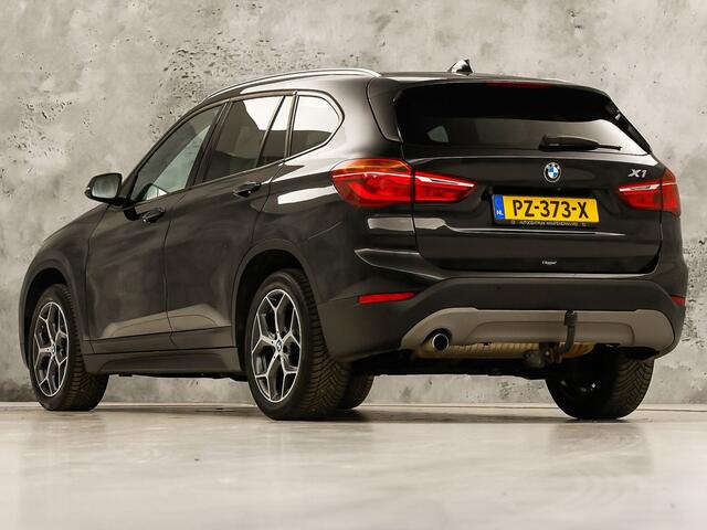 BMW X1 sDrive18i Sport High Executive 140Pk Automaat (PANORAMADAK, GROOT NAVI, MEMORY SEAT, LEDER, CAMERA, SPORTSTOELEN, TREKHAAK, STOELVERWARMING, NIEUWSTAAT)